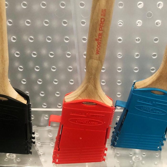 three cut-n-edge lined up in black, red and blue at the National Hardware Show