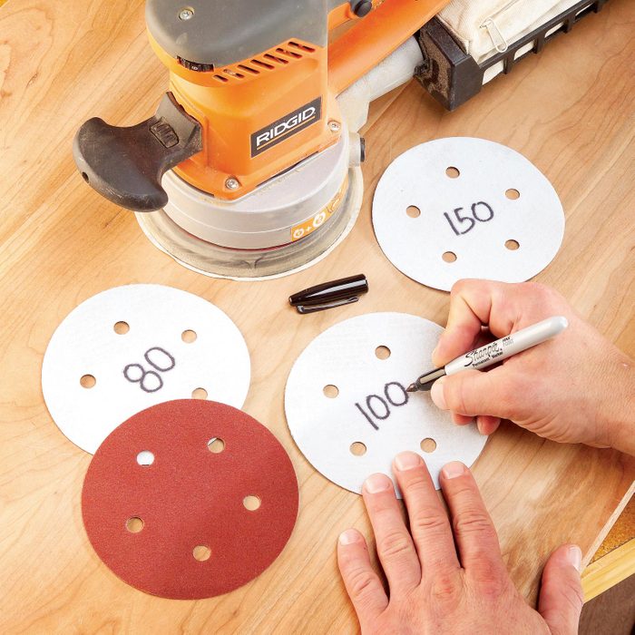 writing grit numbers on the back of sandpaper disks