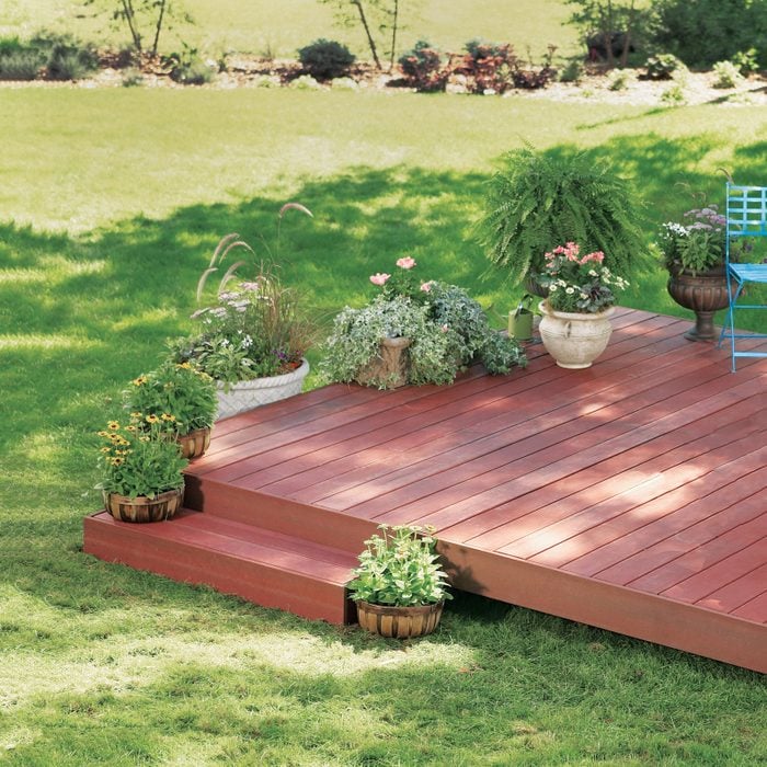 Easy Diy Deck with steps and potted plants