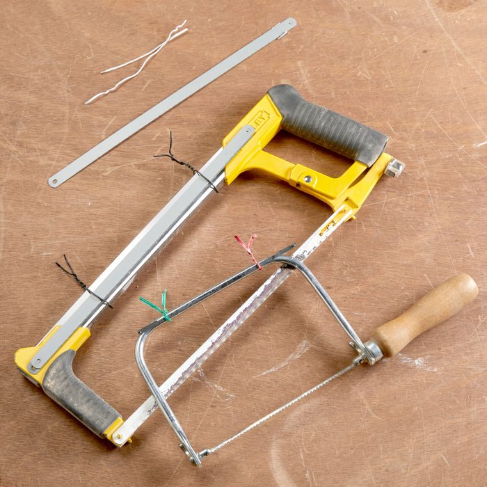 twist ties attaching spare blades to a hack saw