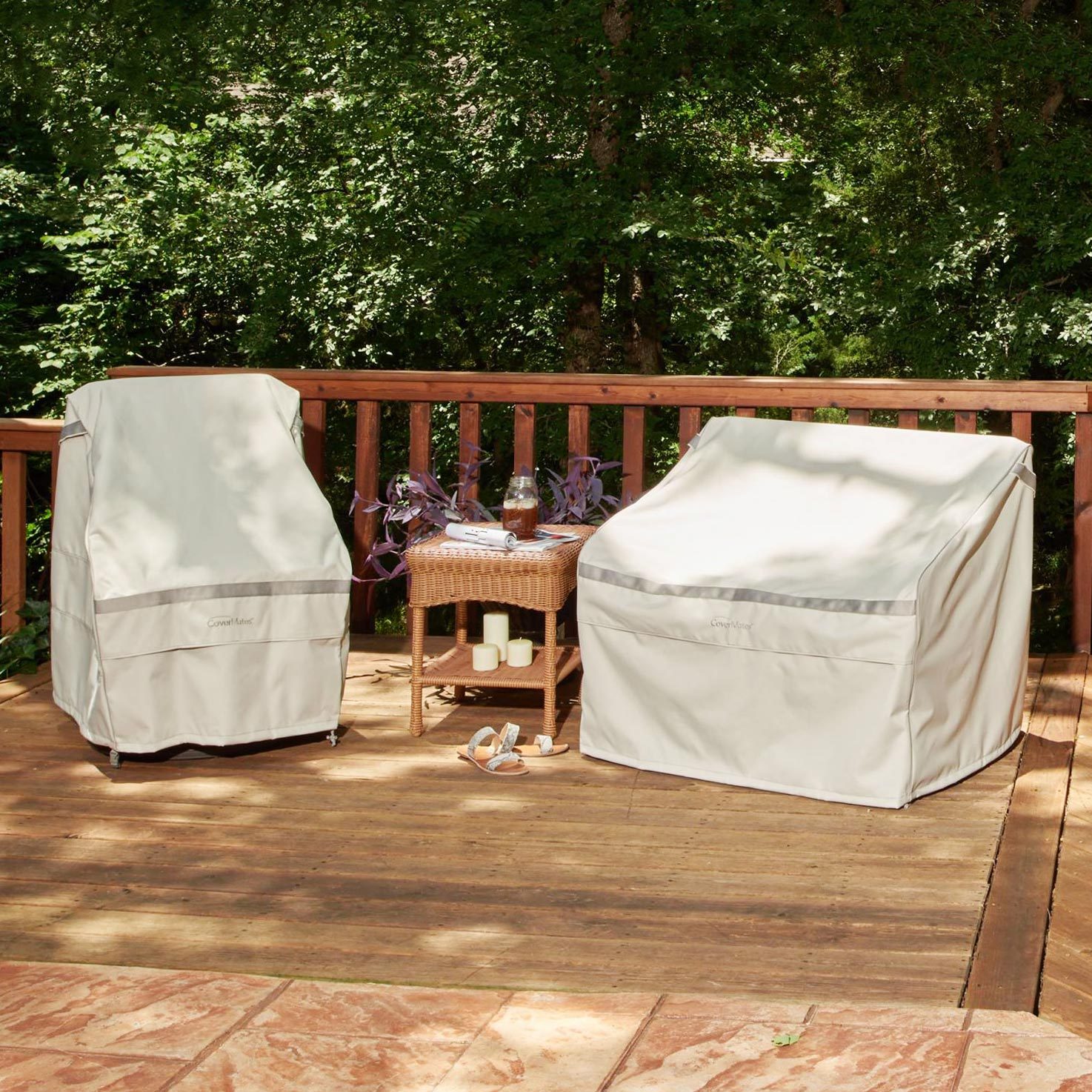 two chairs on a wooden deck covered with the cover store furniture covers