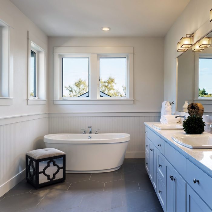 spa like Bathtub and sinks in modern renovated bathroom