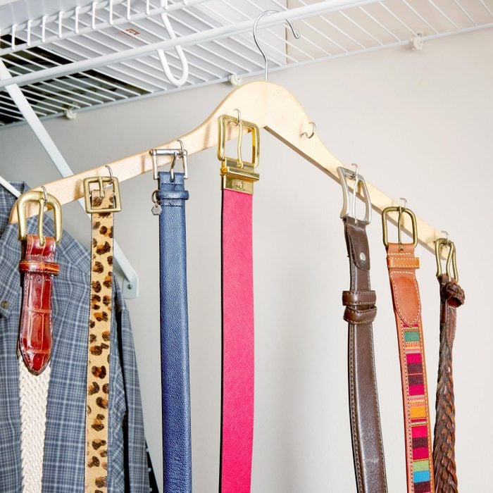 using one hanger with hooks attached to hang belts