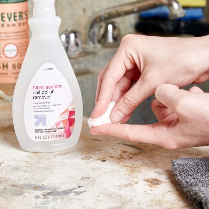 removing super glue from finger with nail polish remover