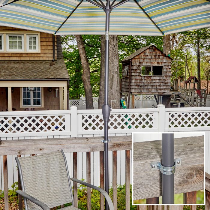 Moveable Deck Umbrella with a close up of the umbrella bracket in the bottom right corner 