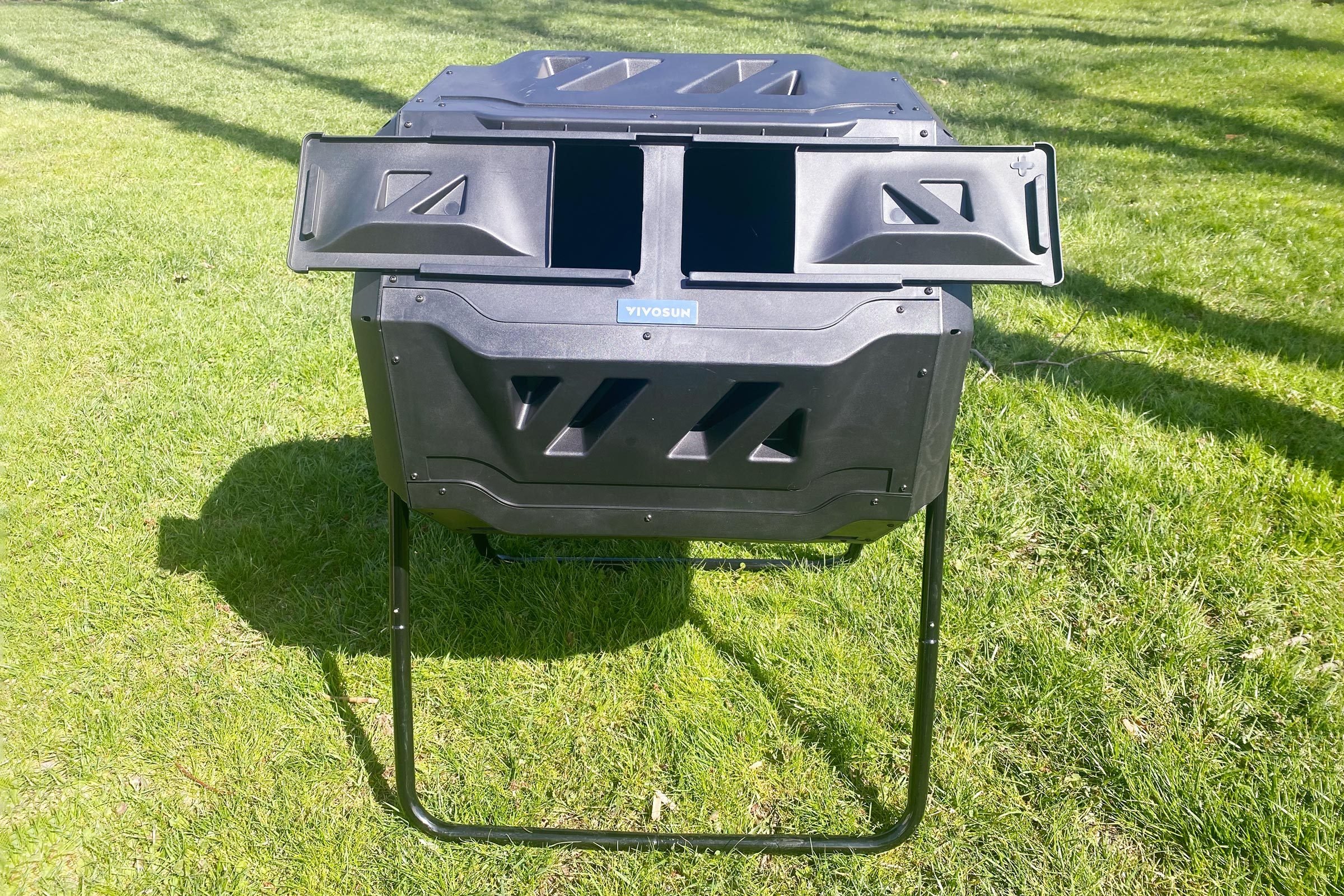 Vivosun Compost Bin standing in the grass of a backyard