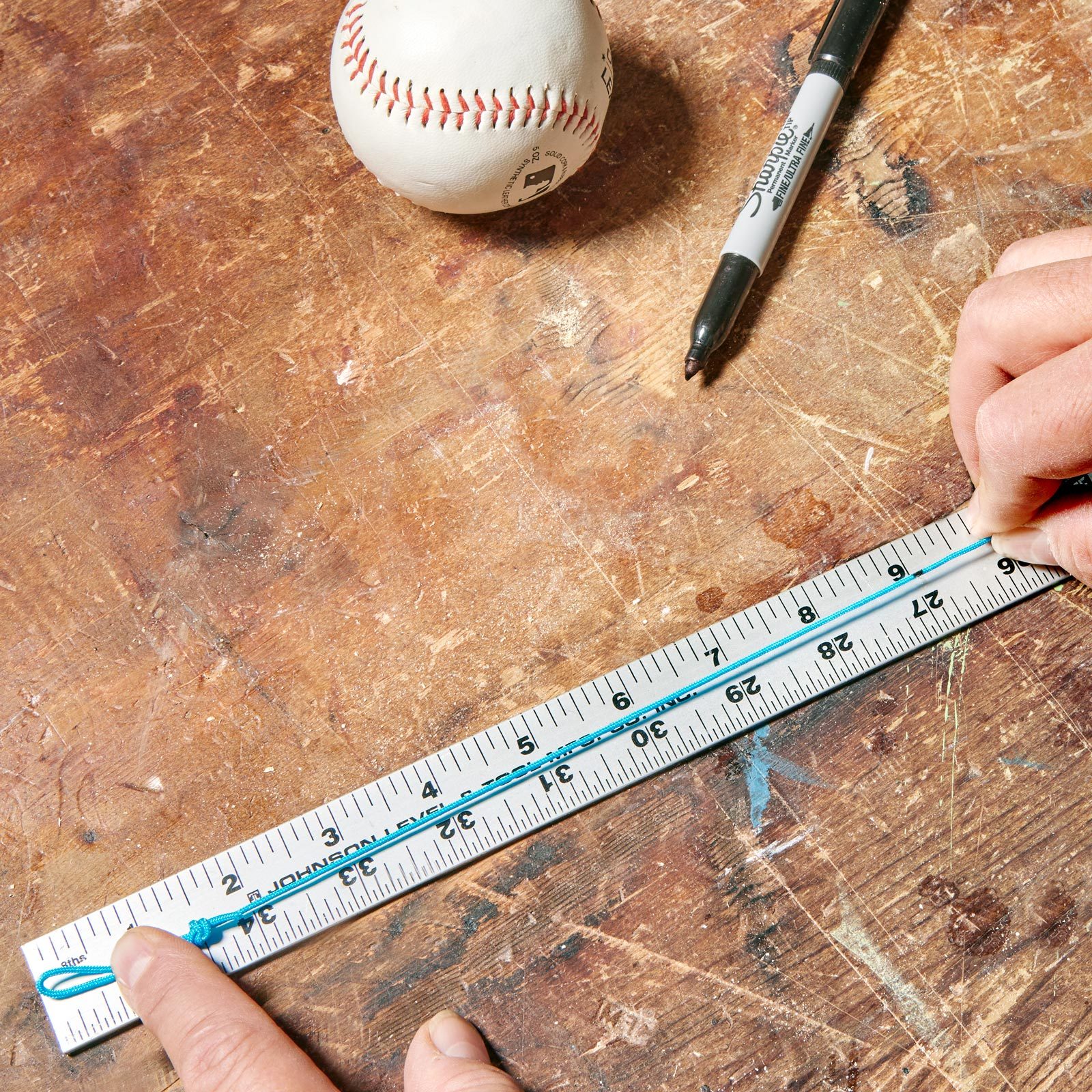 measuring a baseball with string