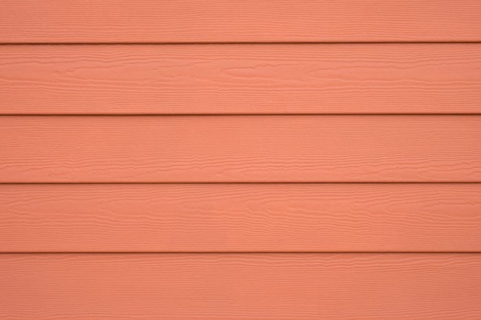 WOOD SUBSTITUTE WALL SIDING FOR BACKGROUND , ORANGE COLOR