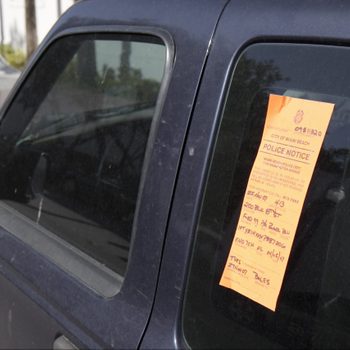 A police notice on an abandoned vehicle at Miami Beach