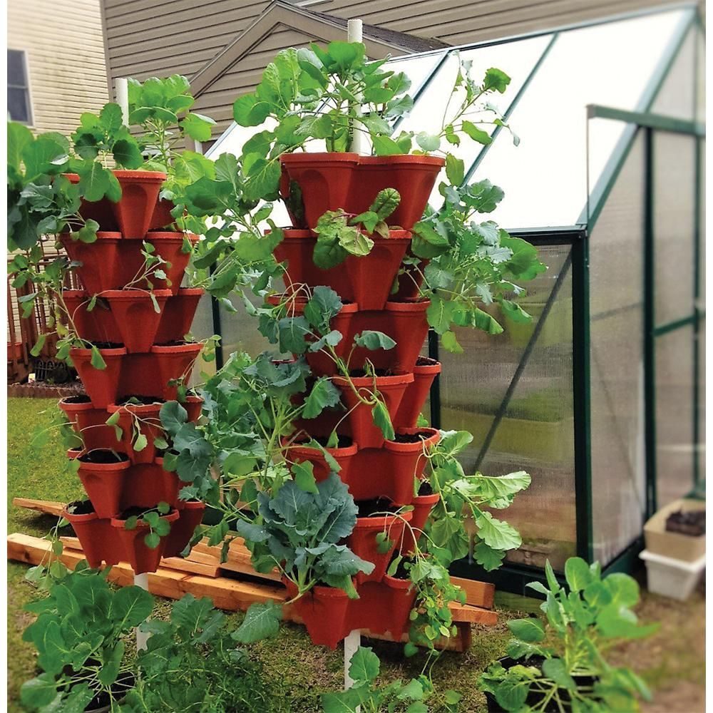 https://www.familyhandyman.com/wp-content/uploads/2022/07/mr-stacky-terracotta-plastic-vertical-stackable-planter-ecomm-via-homedepot.com_.jpg?fit=700%2C700