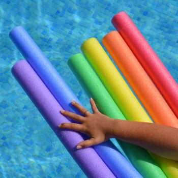Arm On Swimming Pool Noodles In Rainbow Colours