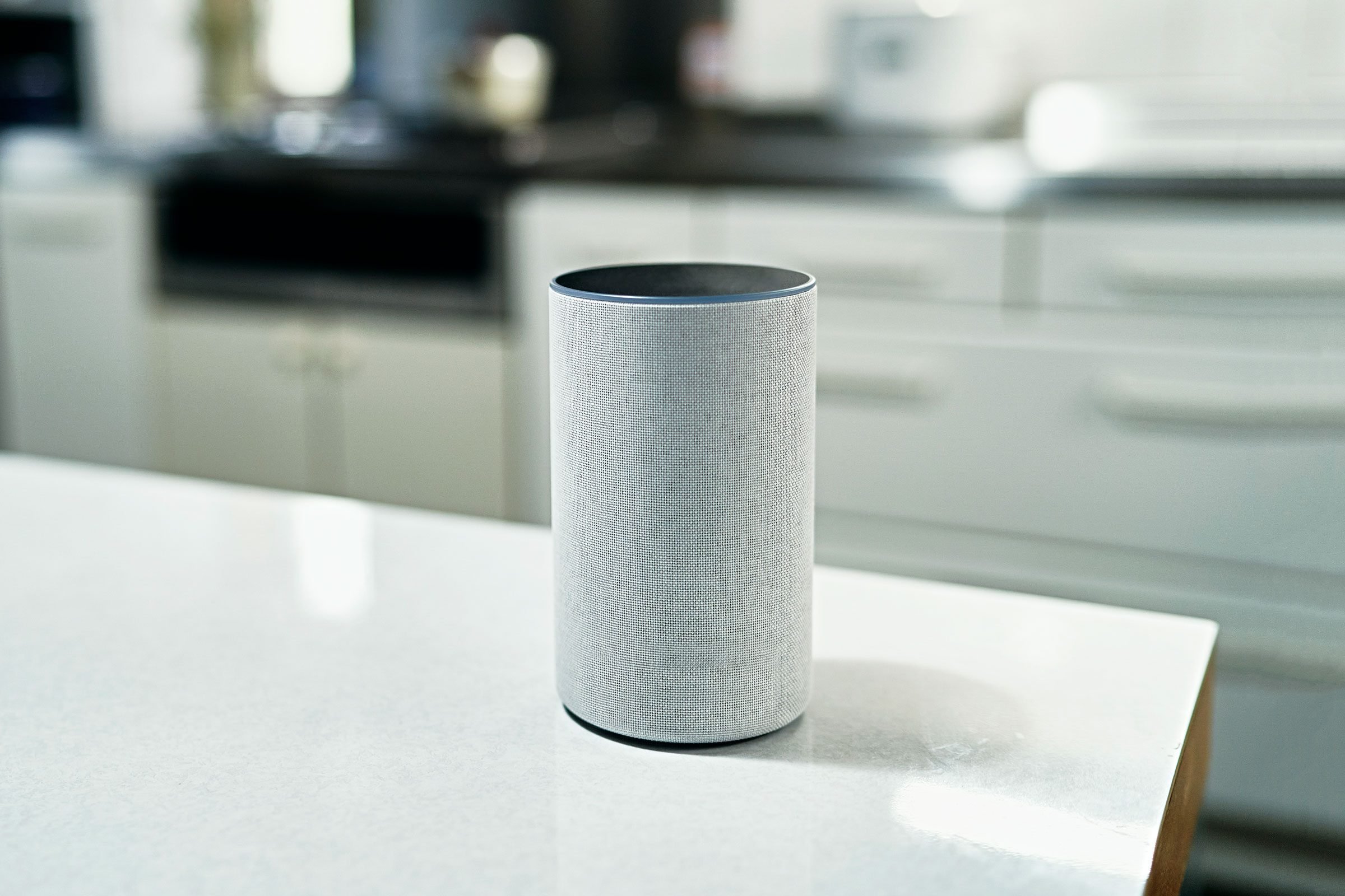 Amazon Alexa sitting on a kitchen counter