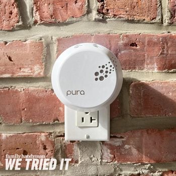 Pura Home Fragrance plugged into a wall