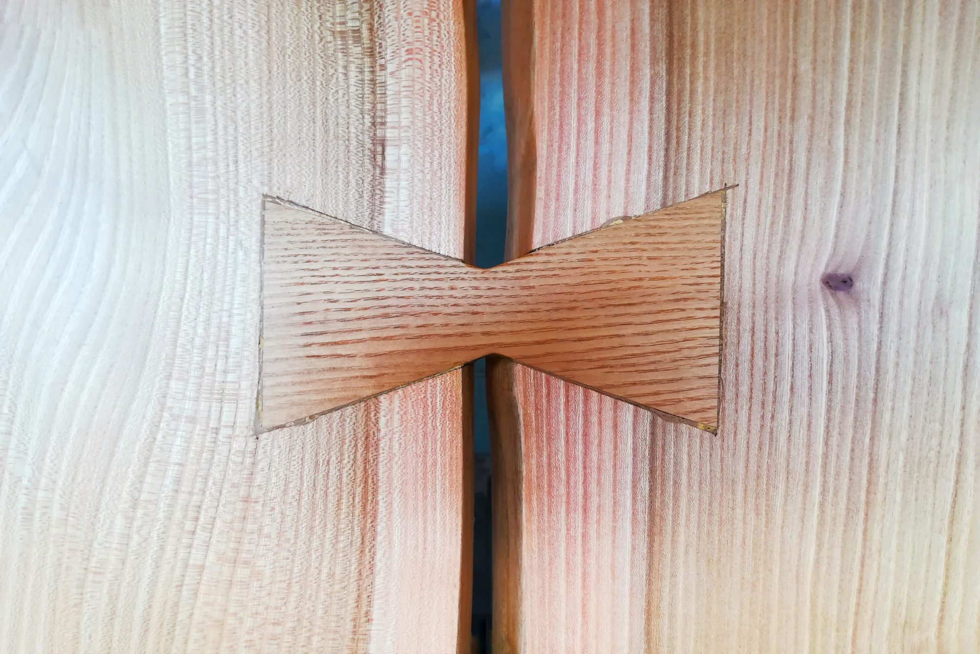 wood inlay bowtie to join two boards