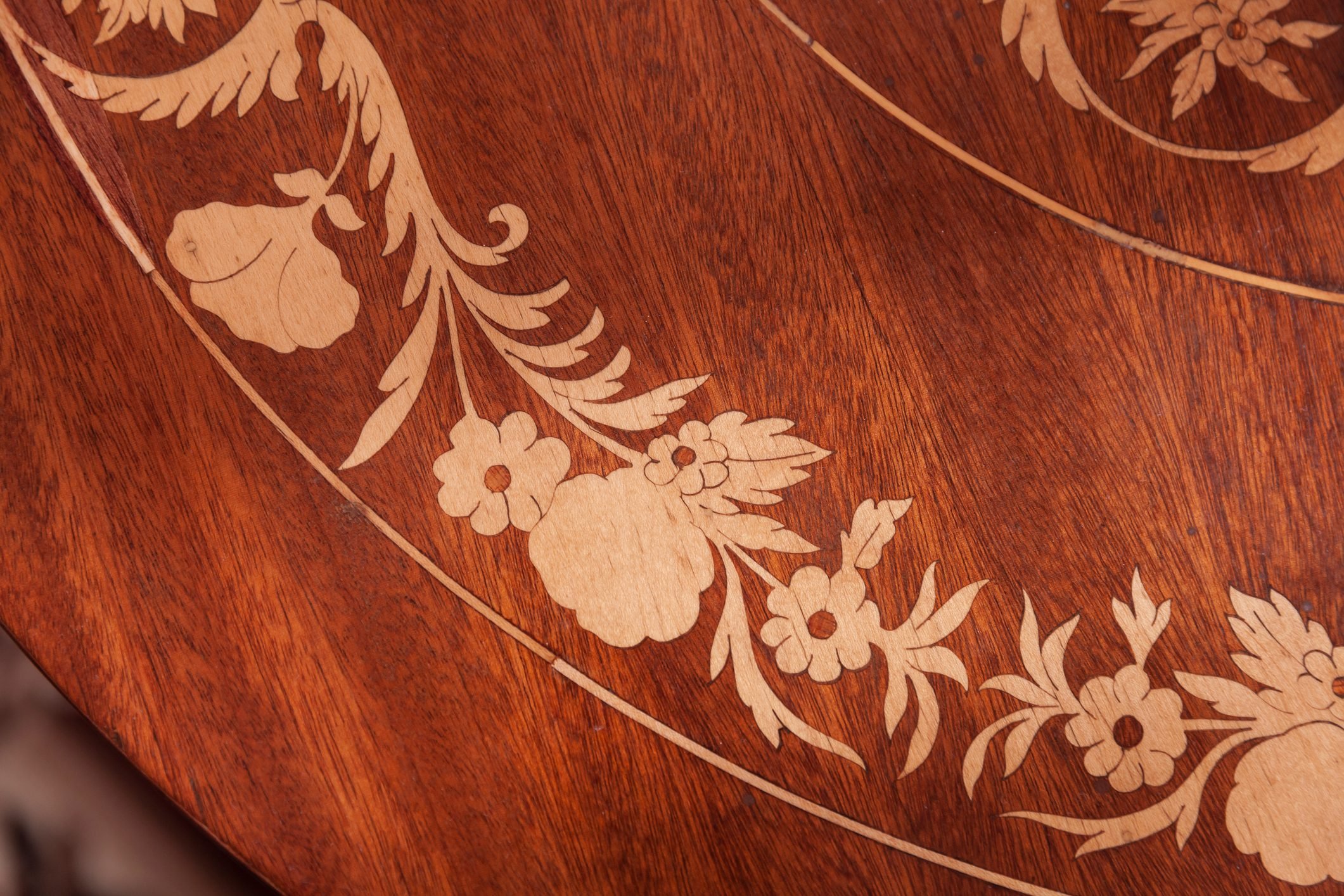 Decorative inlay carving on a wooden table