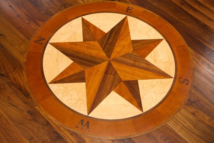 Compass inlay in a hardwood floor.