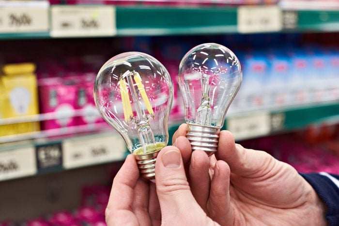 LED and incandescent lamp on store