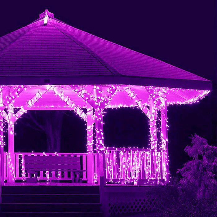 purple christmas lights on a gazebo