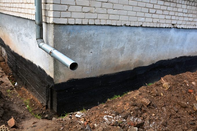 Waterproofing a house basement foundation from the outside