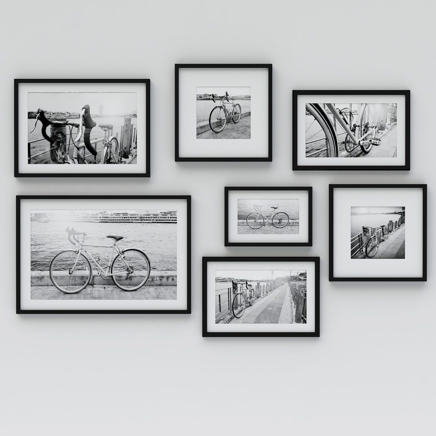 frames on wall with black and white photos