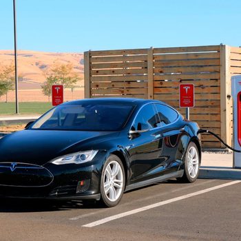 Tesla electric car at charging station
