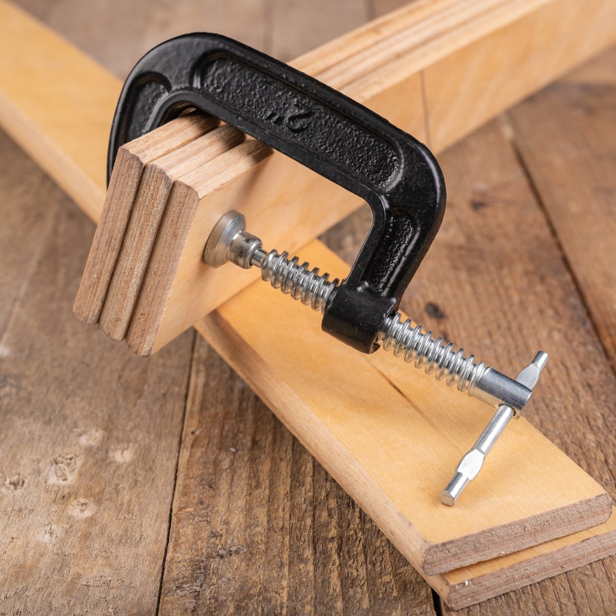 What do people do with clamps and wood? Why do people talk about how you  can 'never have too many clamps?' What is the purpose of clamping 2x4s (or  other kinds of