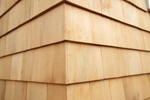 close up of a corner on a house with shingles