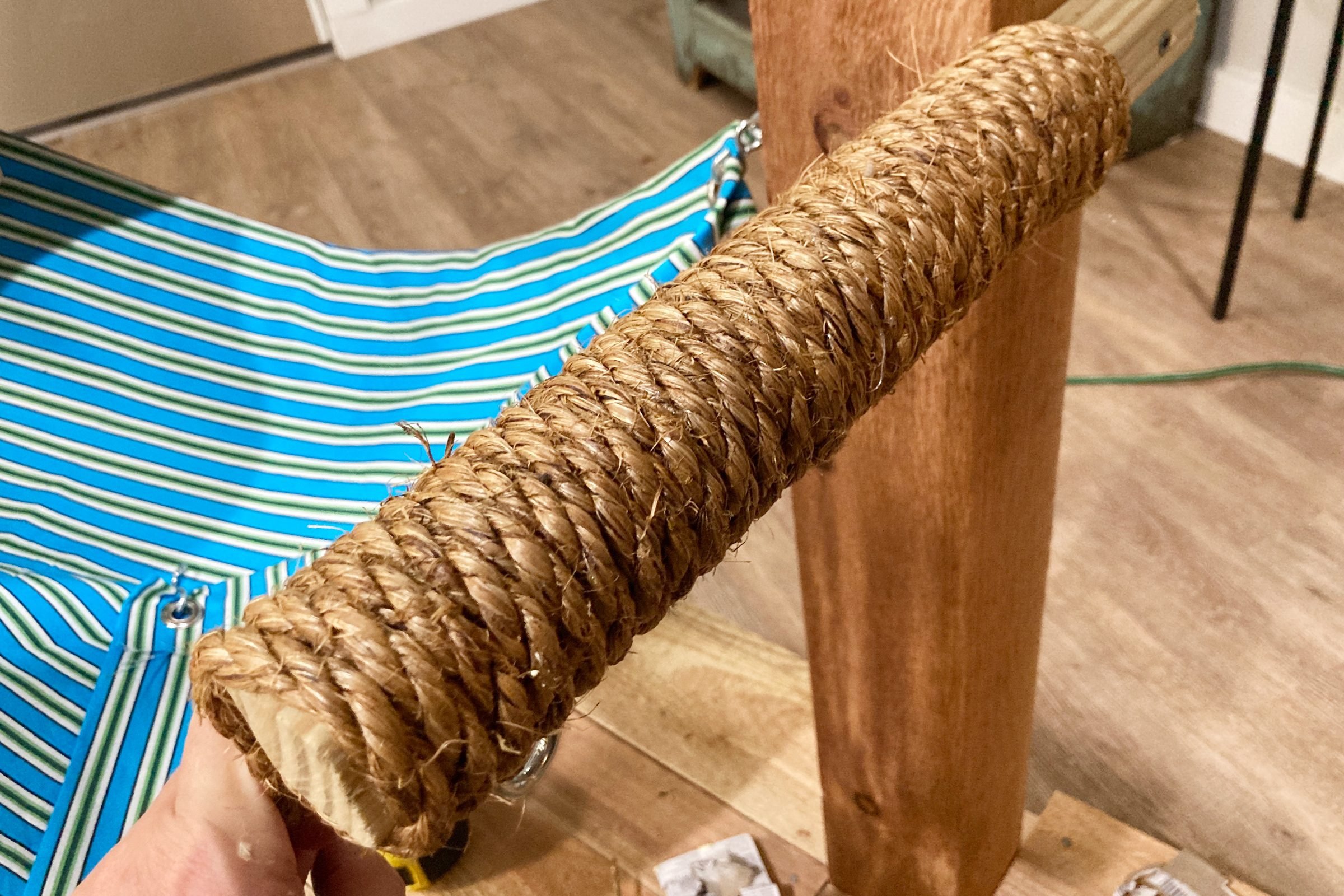 wrapping thick sisal on a DIY cat tree for scratching