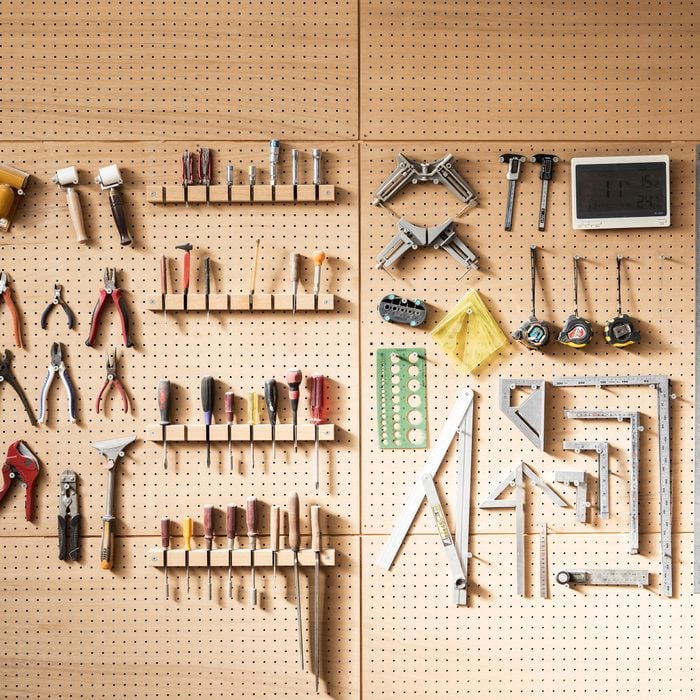 Various Tools Arranged On The Wall