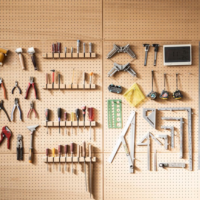 Various Tools Arranged On The Wall