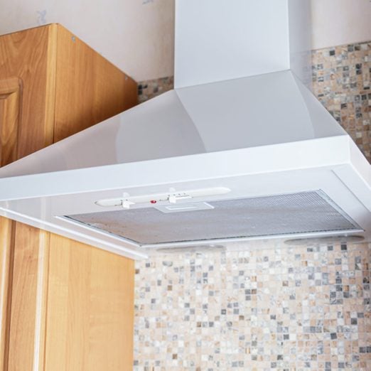 white range hood in a kitchen