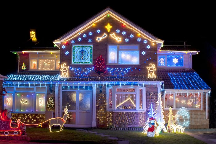 House colorfully decorated with bright Christmas lights