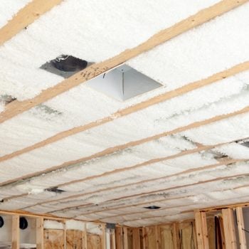 Blown Insulation Installed Between House Floor Joists