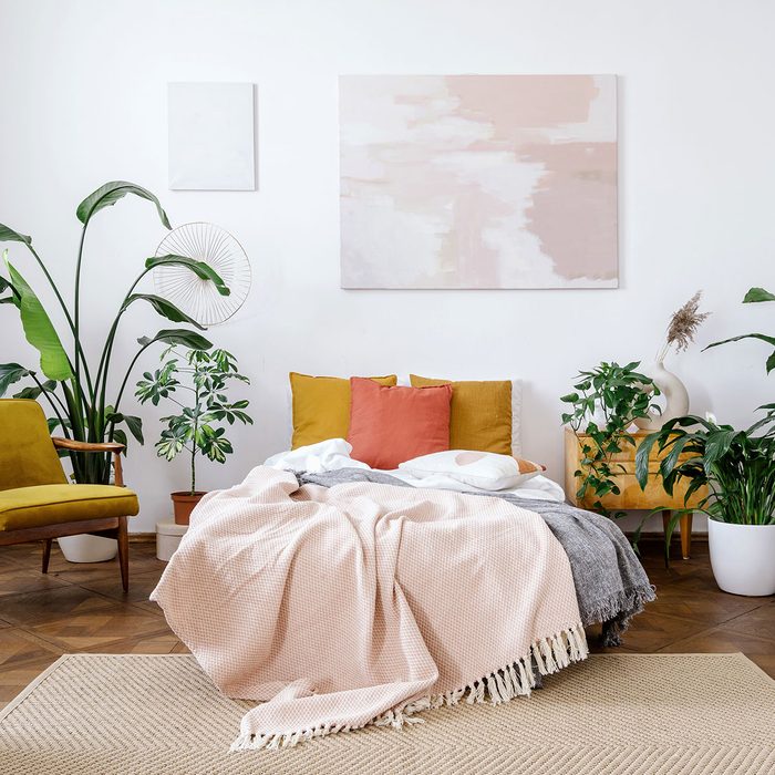 Light Bedroom In Apartment With Retro Interior Design