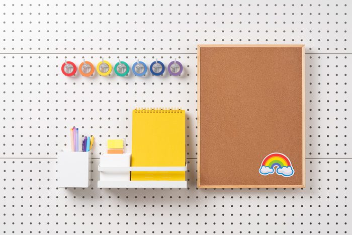 Bulletin Board With Stationary Hanging on Pegboard