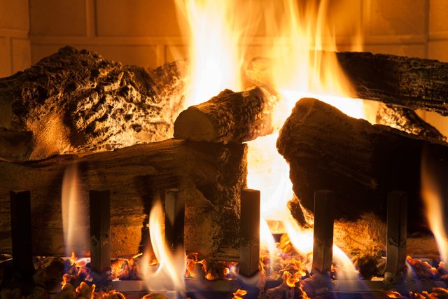 Closeup of Logs Burning in a Gas Fireplace