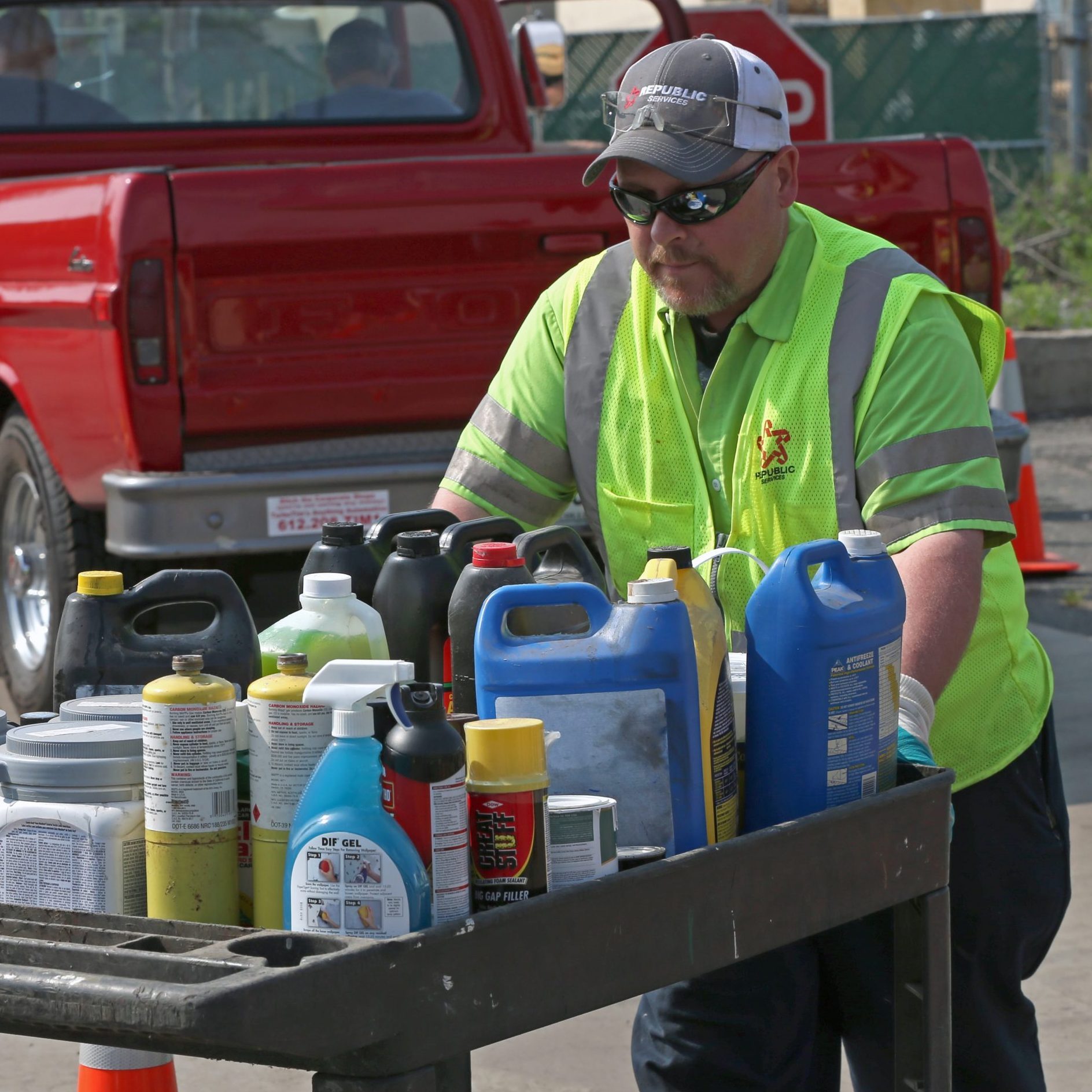 (right) Republic Services event cordinator Mike Alderson and his crew sorted through hazardous household items brought in by county residents during a recycling event held on 5/31/14, at 44th Street in Minneapolis. Hennepin County and its partner cities