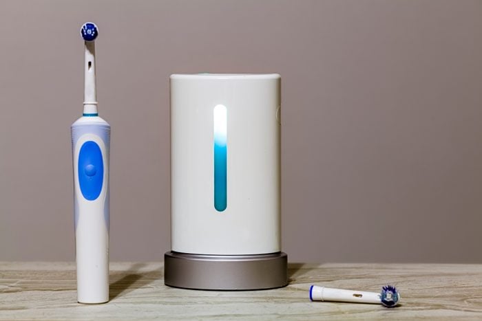 electrical toothbrush with UV sterilizer device