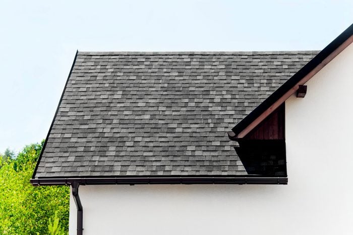 View of two perpendicular apex roofs with slate tiles