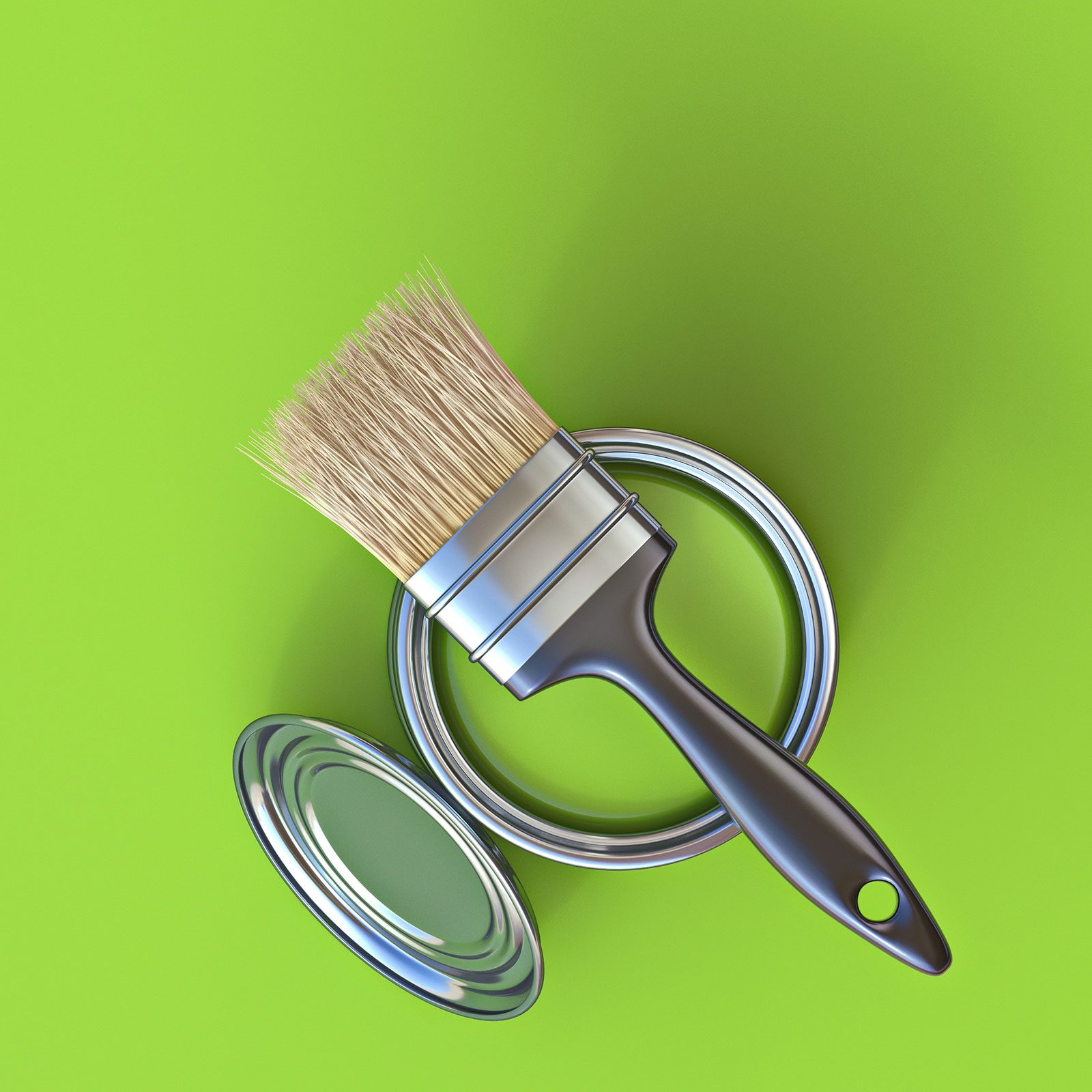 Paintbrush On Top Of Green Paint Bucket With Green Paint Background