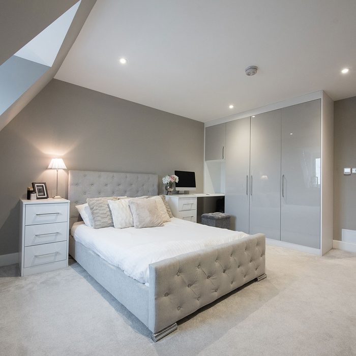 Gray colored bedroom in a luxury apartment
