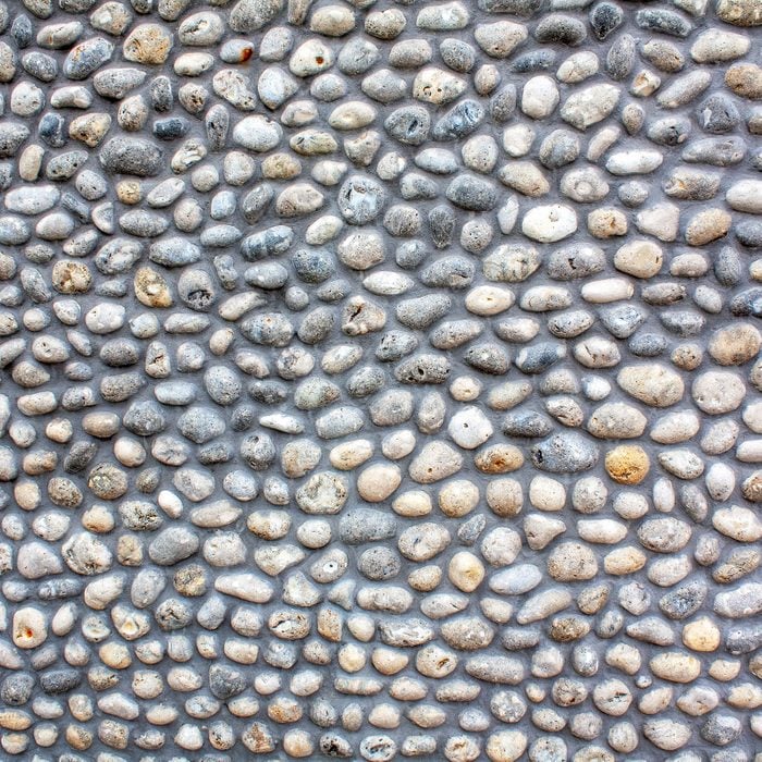Pebbles cover an interior home wall