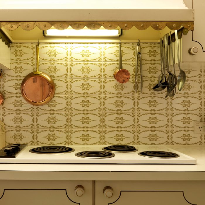 Retro Home Kitchen with Dated Backsplash tiles