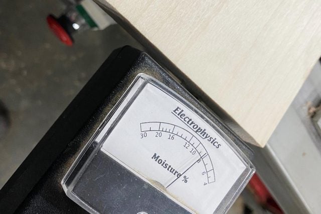 Checking wood Moisture with a meter