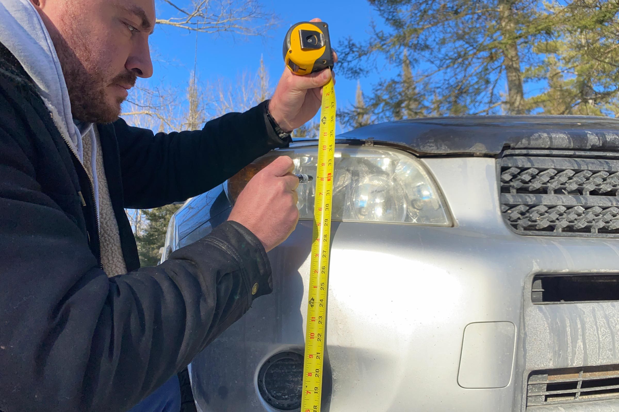 using a tape measure to Mark Headlights