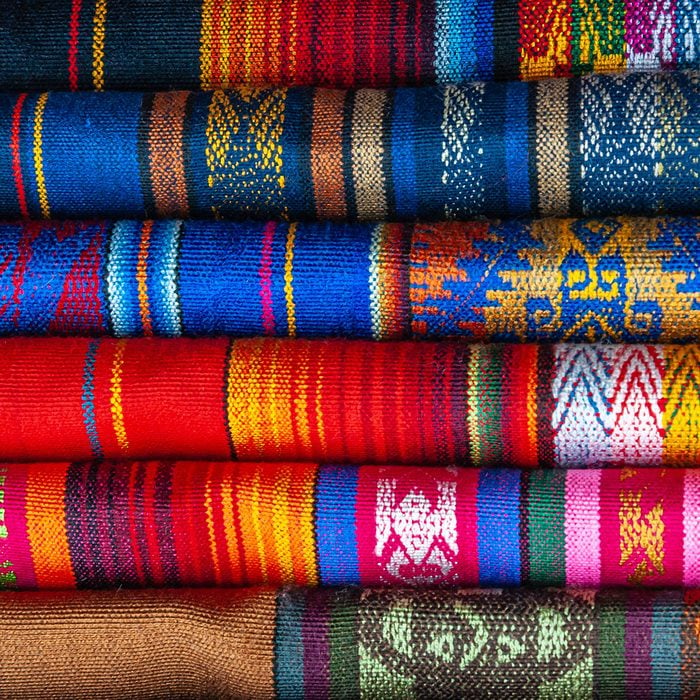 Andean Textiles From Ecuador on display at an outdoor market