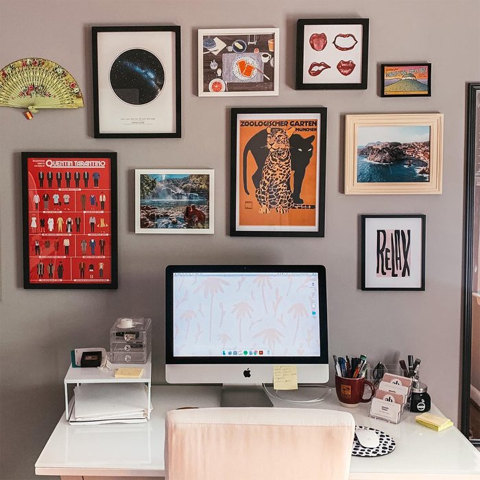 apartment office with picture frames hanging on the walls