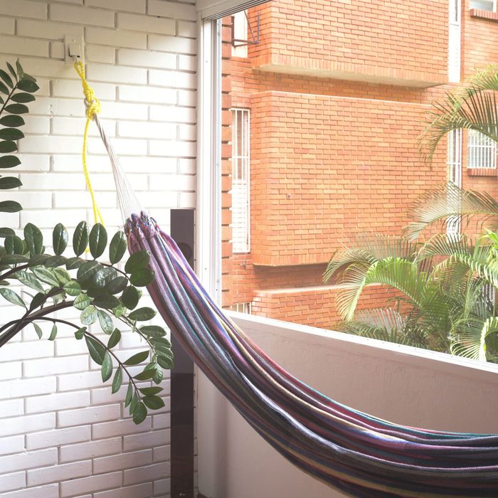 A hammock by a window