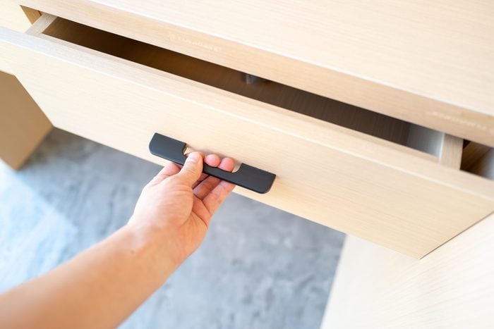 Pull the drawer handle to open the drawer