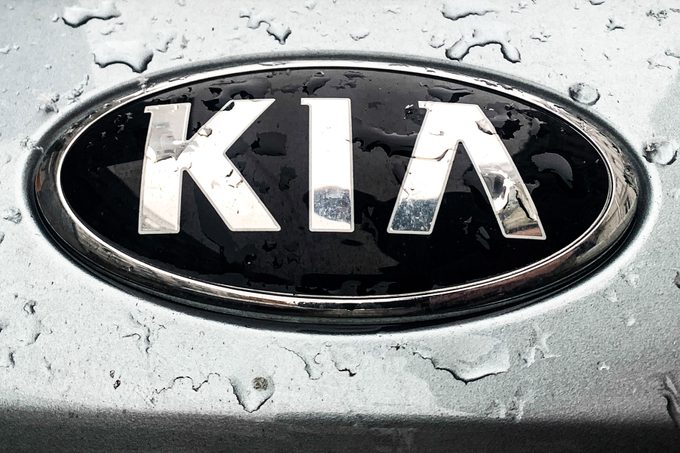 Raindrops are seen on the KIA logo on the car